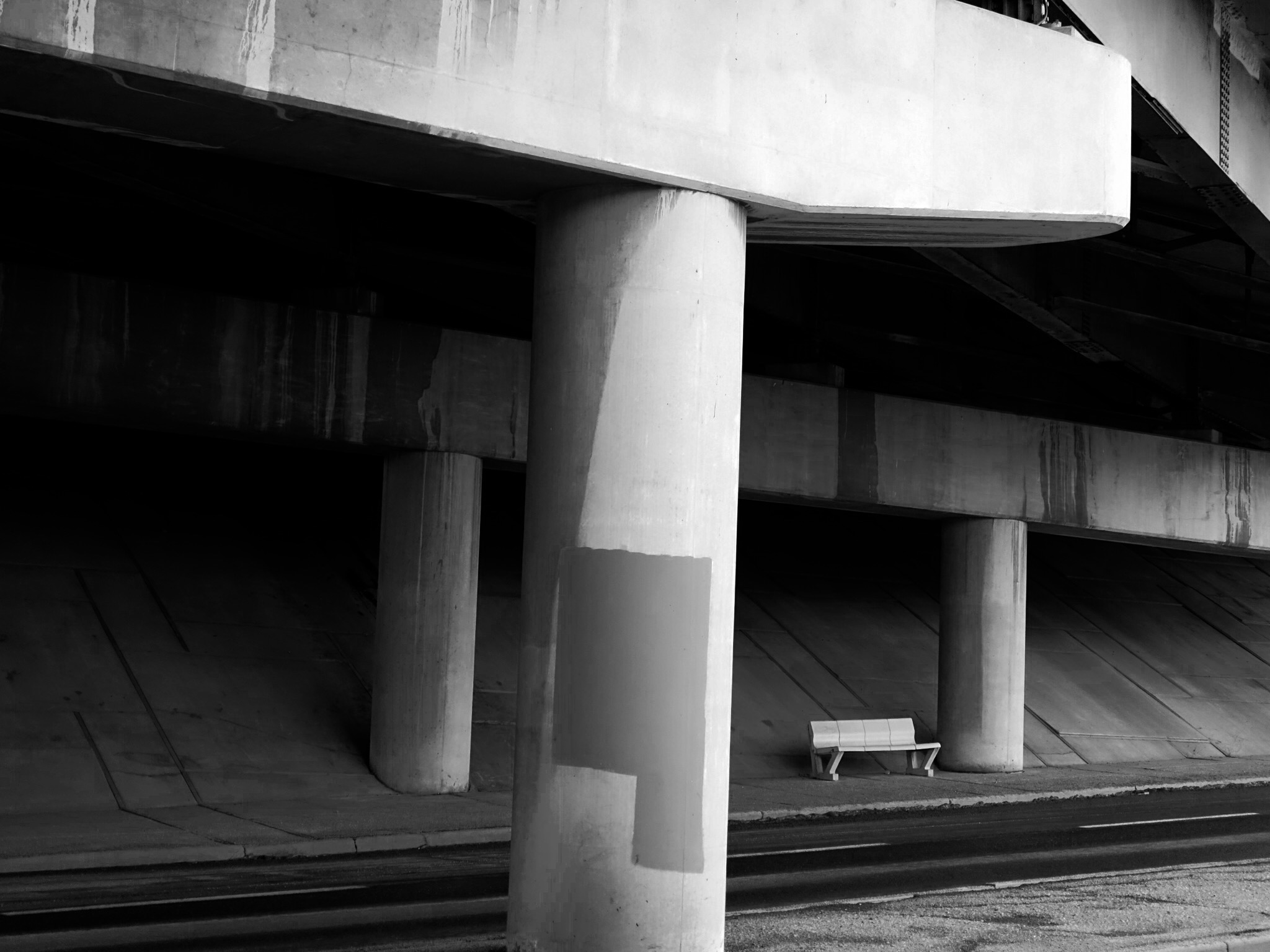 I have no idea who thought it was a good idea to have a bench at this location under Bow Trail. It has to be one of the most brutal urban places in Calgary. 