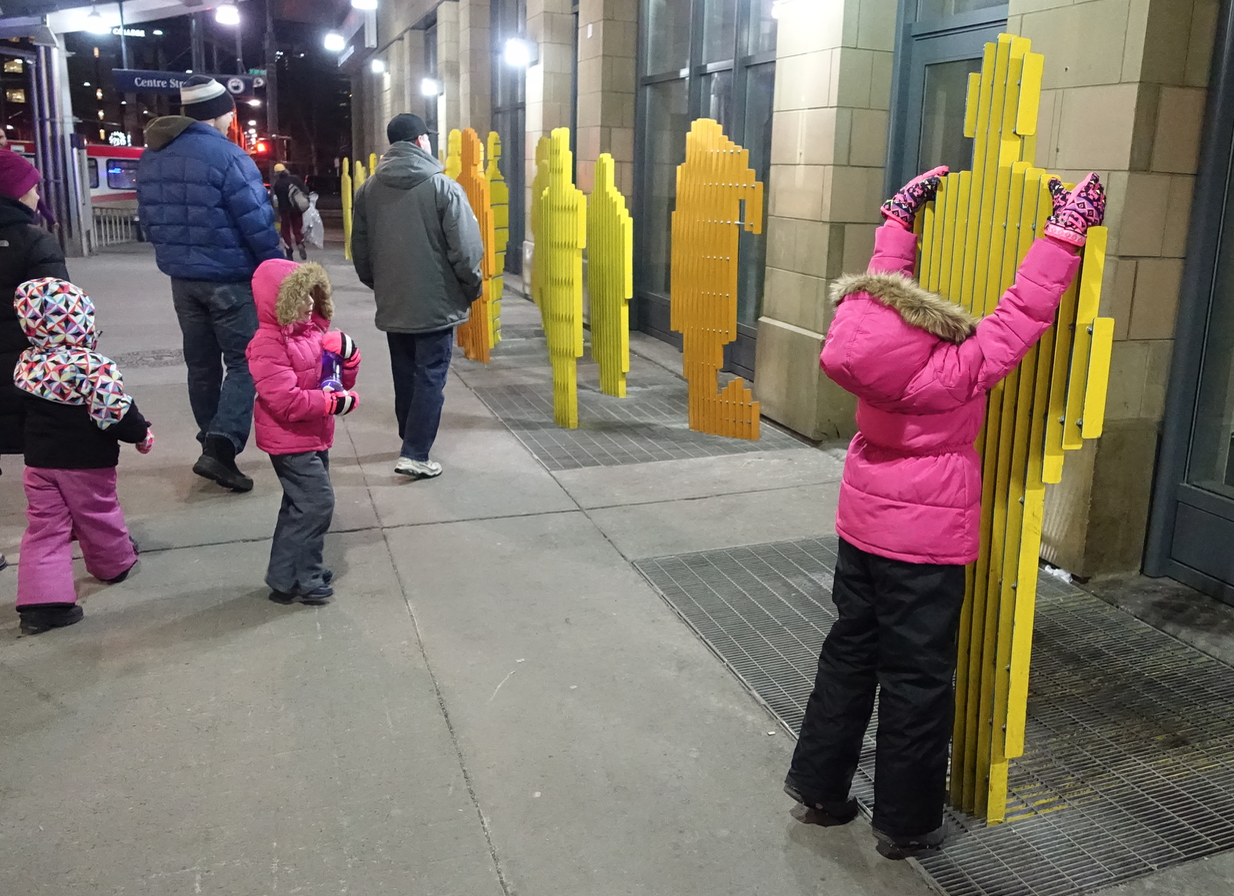 Downtown Calgary's other public art came alive with young children exploring them. 