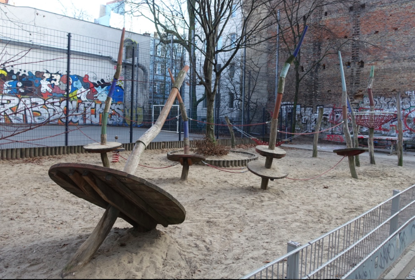 I told you the playgrounds were old school. These look like huge spinning tops. 