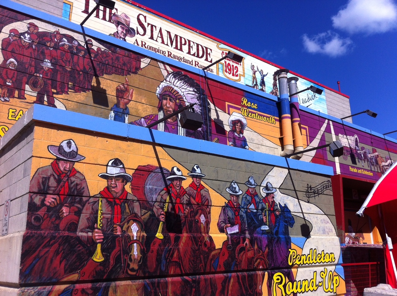 Just one of the many murals that grace the walls of several Stampede Park buildings. (link: Calgary Stampede Public Art)
