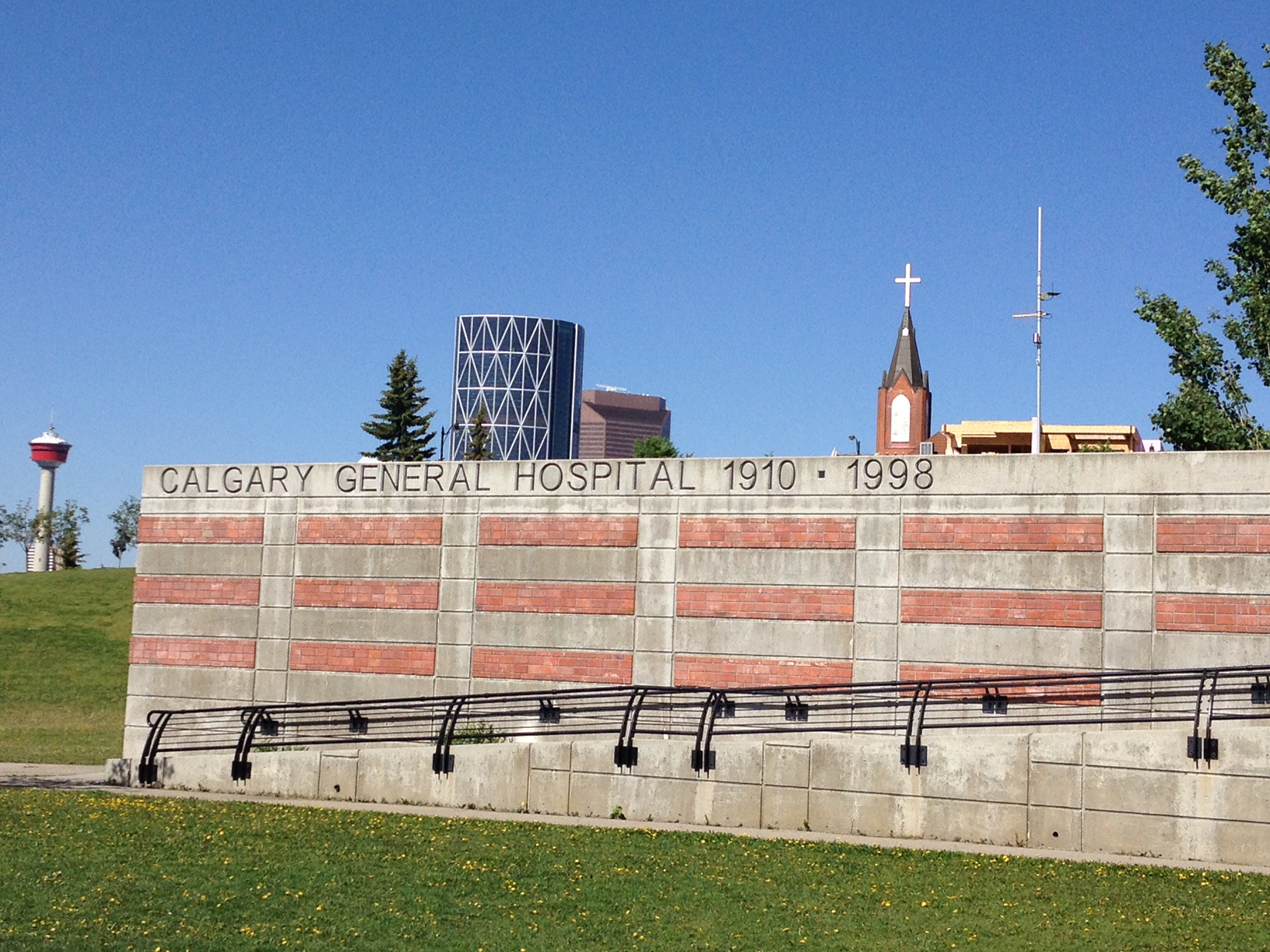 Monument to Calgary General Hospital with Calgary Tower in the background. 