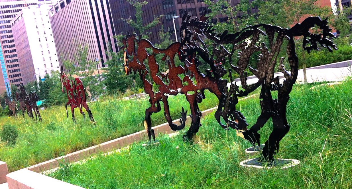 Not all new public art is controversial, this piece by Saskatchewan artist Joe Fafard is the centre piece for the Hotchkiss Gardens. Below the garden is a 700 stall parking garage. This artwork and installation cost $500,000 and was paid for by donations from an individual and corporation.