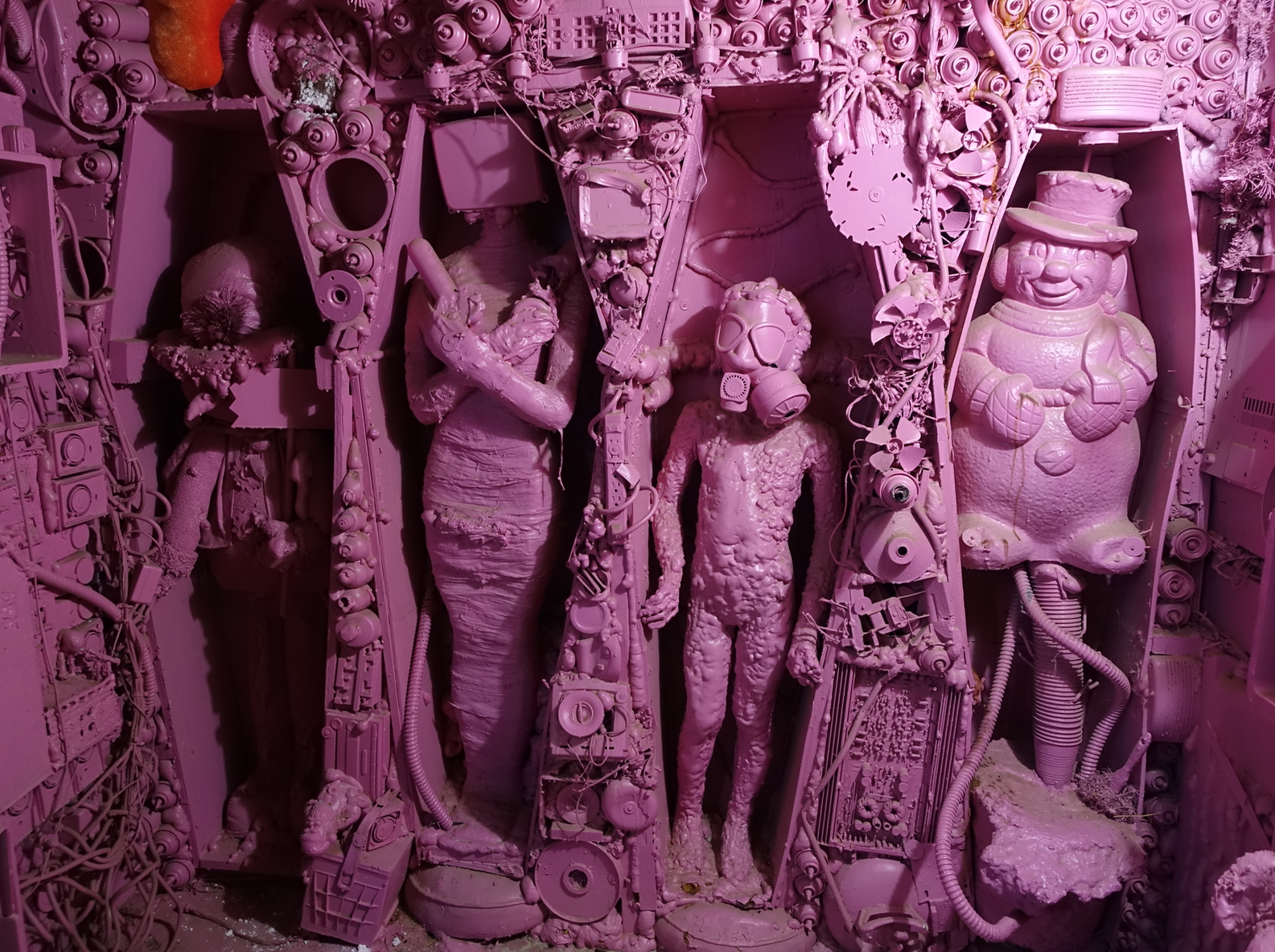 Close-up of the many figures that are incorporated into the body of the figures. You could spend hours examining the details of each piece and speculating on why the artist chose to incorporate the pieces he did for each creature.