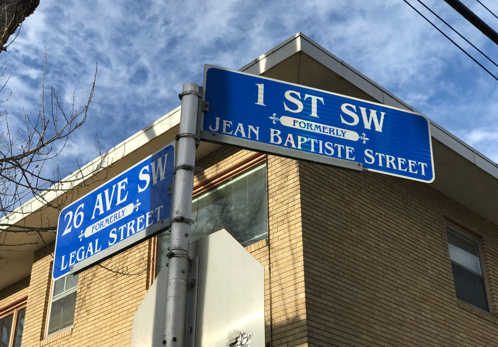 I love that the former street names have been added to the street signs as reminder of the history of the community. 
