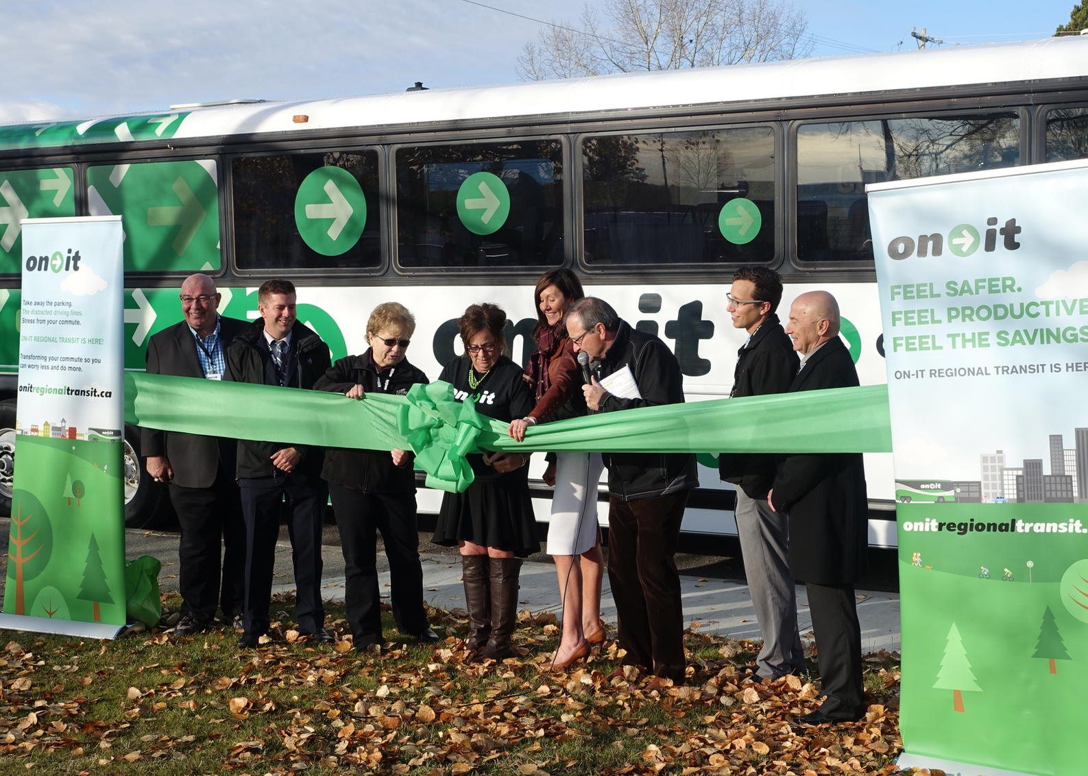 With much fanfare Colleen Shepherd (brown jacket) and others launched On-It Regional Transit in October 2016. 