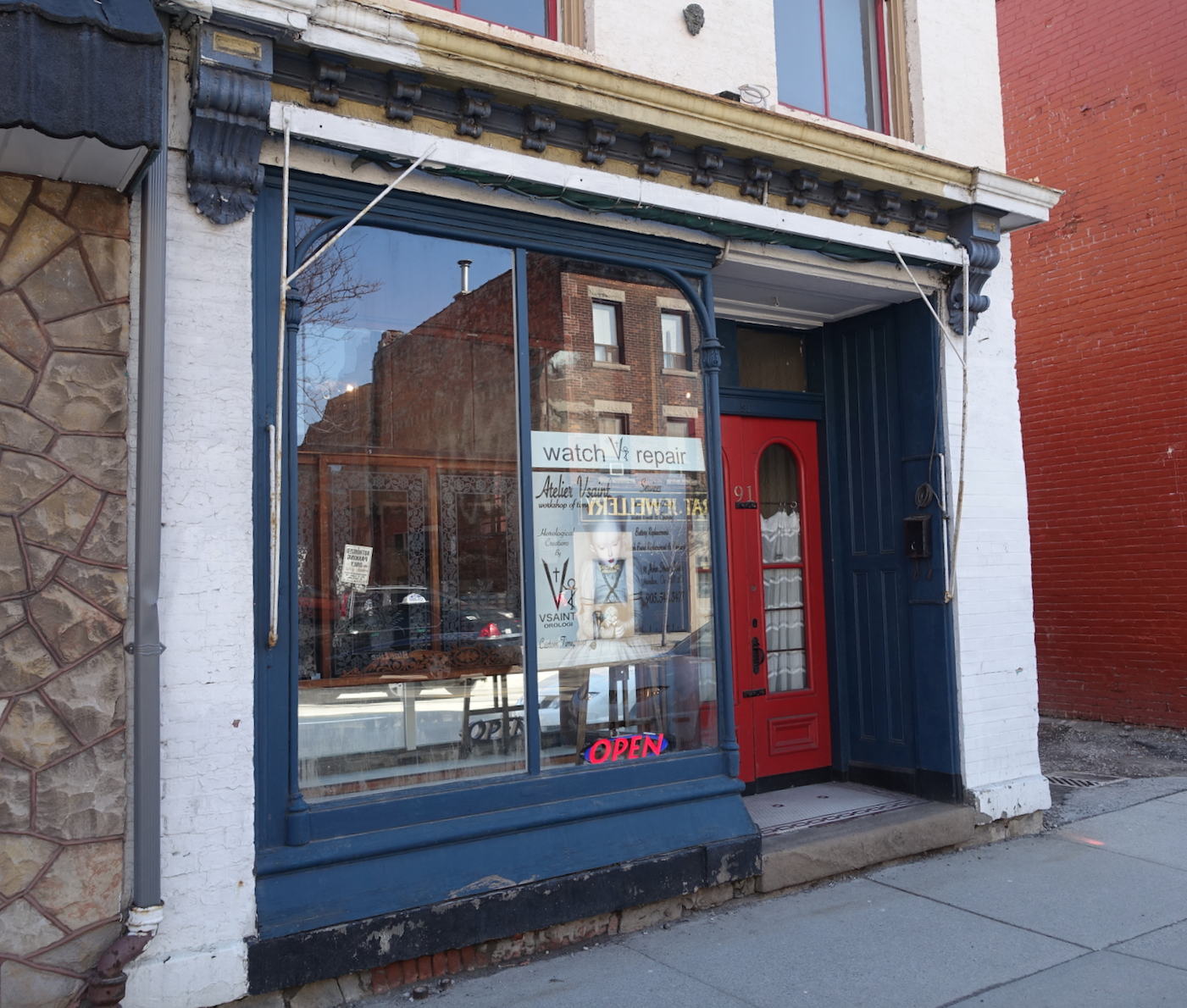 Was it the poster or the red door that made us want to go in?