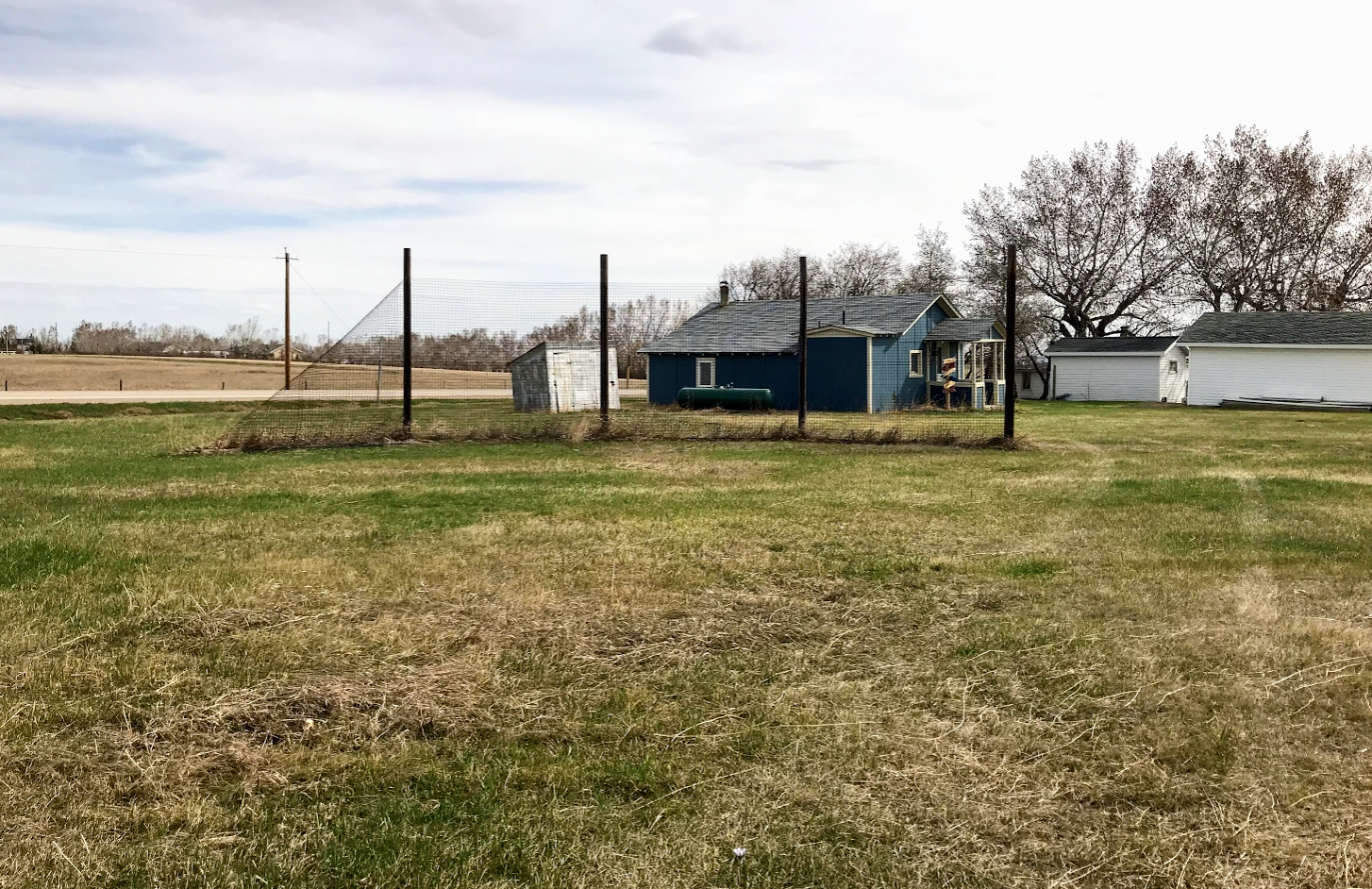 The old baseball diamond looks like it hasn't been used in many many years. 