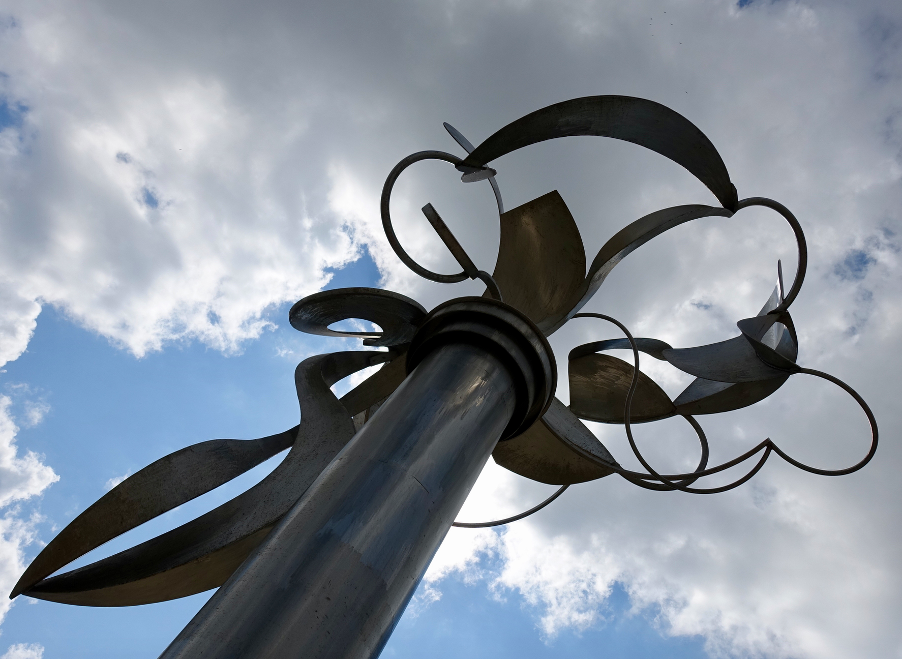 Move just a few feet and it looks like scissors and thread. I love ambiguous art that has reference to reality, but lets the viewer interpret the piece in infinite ways. 