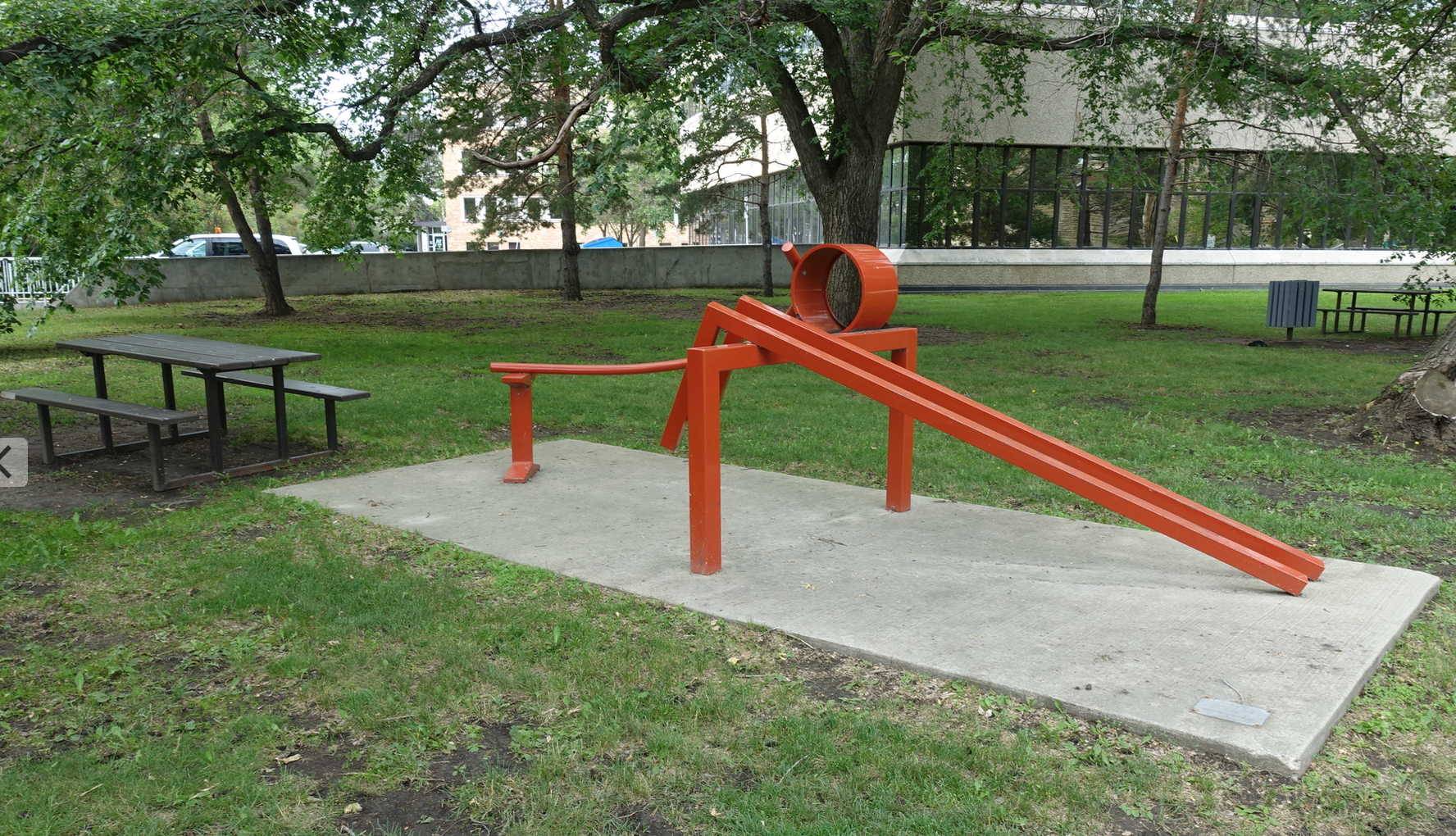 This sculpture, "Jump" by Brian Newman located behind City Hall would fit nicely into a children's playground. 