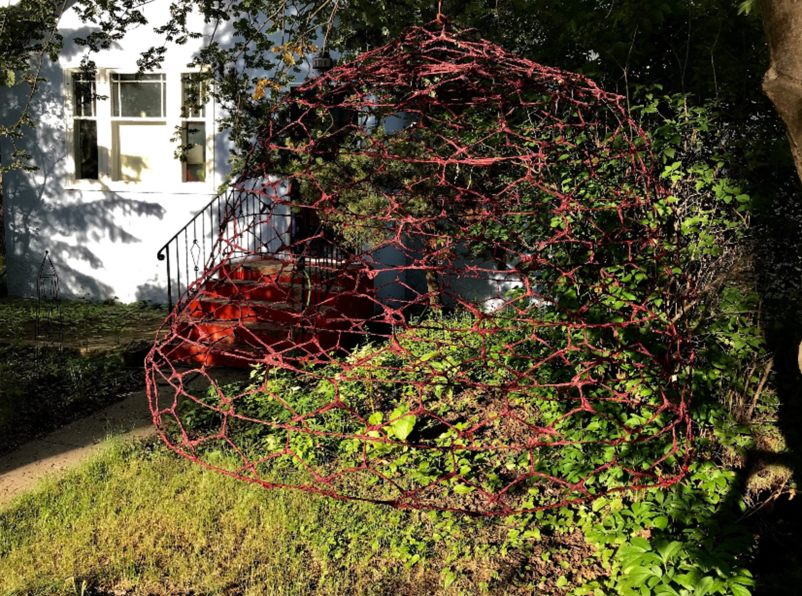 Found this mysterious fabric piece in the front yard of a modest home in the Nutana neighbourhood that could easily be that of an artist. I like the idea of utilizing the front yard as an outdoor gallery or studio space. 