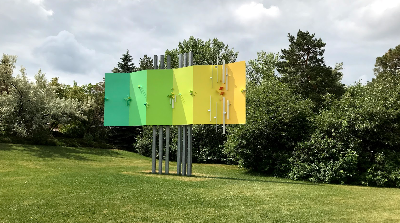 The University of Saskatchewan campus has public art scattered throughout the campus, however much of it has no information on who is the artist, title of the work or date . I later figured out this piece is by Eli Bornstein a famous local artist who has a studio on the banks of the Saskatchewan River just south of the city. The piece is located in front of the Synchroton Research building that studies sources of brilliant light. I thought it was by Ron Kostyniuk who was born in the small community of Wakaw, Saskatchewan, in 1941. He studied at the University of Saskatchewan in Saskatoon and later became an art professor at the University of Calgary where I met him when I was working at the Muttart Art Gallery. 