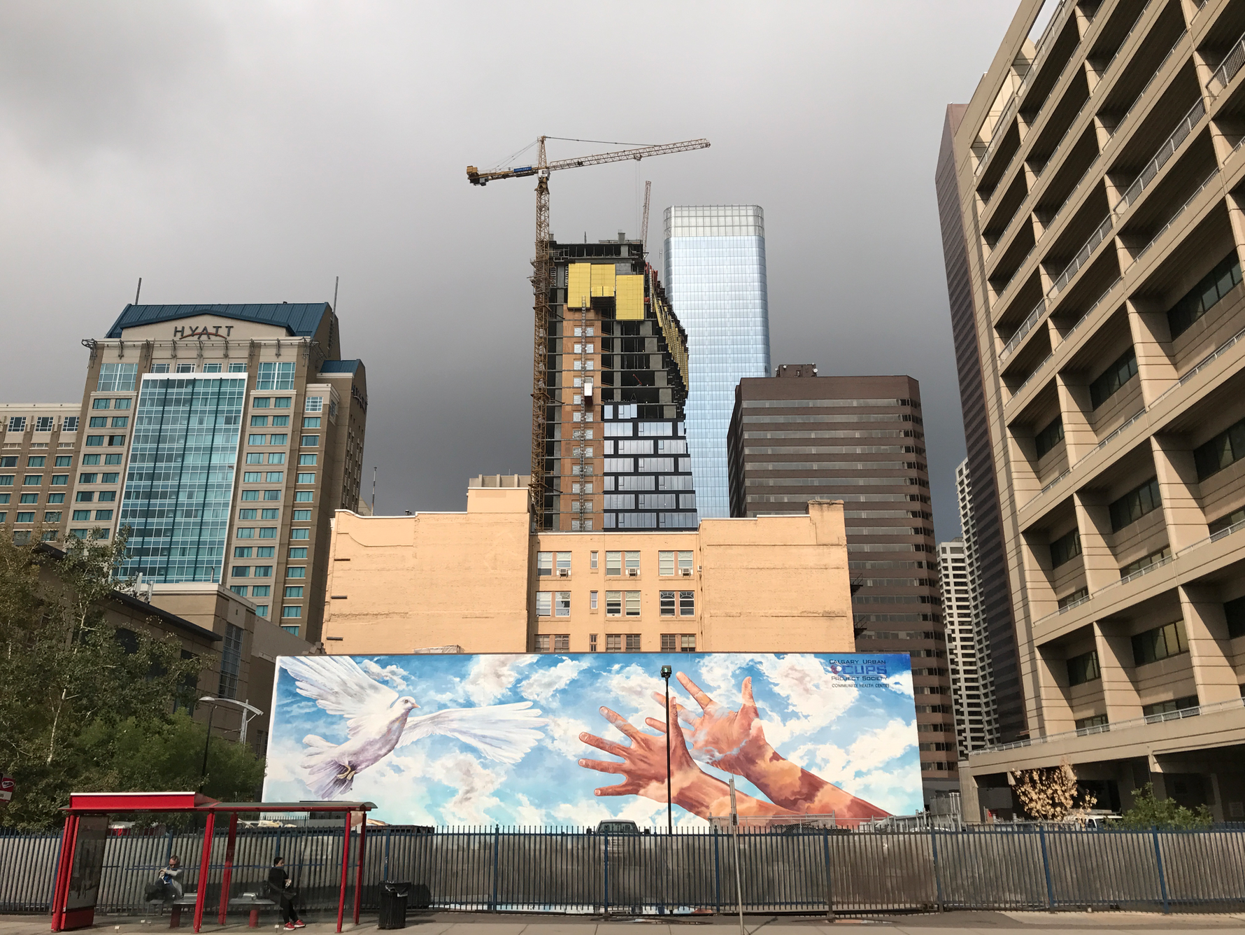 Giving Wings to the Dream, Doug Driediger, east wall of old CUPS building on 100 block of 7th Ave SE. This mural has held up well given it is 20+ years old. Again I like the fact the piece relates to the site, which was home to Calgary Urban Projects Society (helping people in need) when it was first commissioned. I think it talks nicely about Calgary as a caring city. 