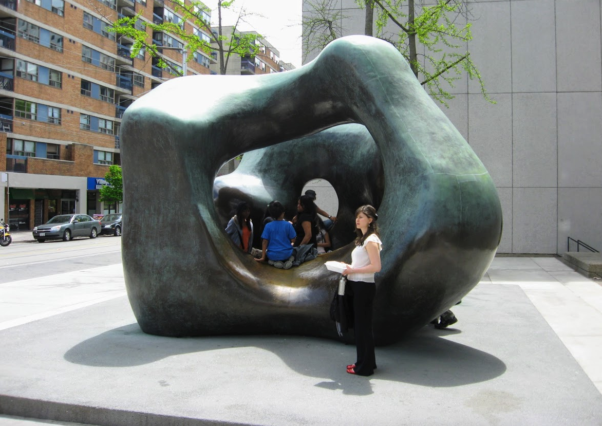The Henry Moore sculpture outside the Art Gallery of Ontario is a popular place to play for children.
