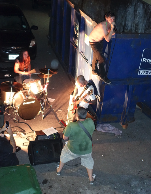 Found this grunge band playing in a dark back alley half a block off of James St N. Anything goes during SuperCrawl.
