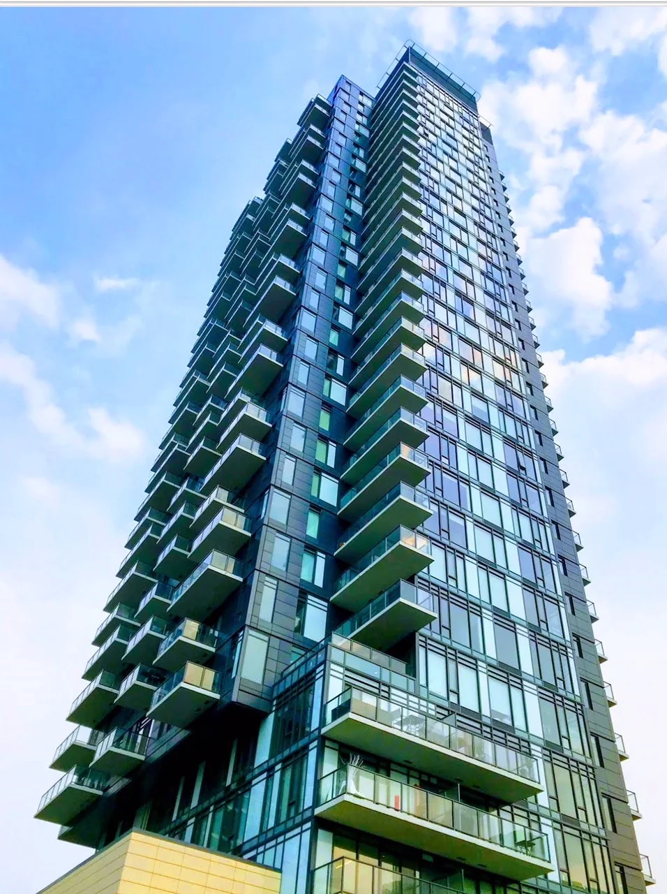 Brad Lamb’s 6th & Tenth condo is one of several new condo towers in Caglary’s hip Beltline district. 10th Avenue SW next to the CPR’s main line was once a warehouse district, today it is quickly becoming a trendy street with bars, restaurants, condos, a new hotel and even a very busy bottle depot.