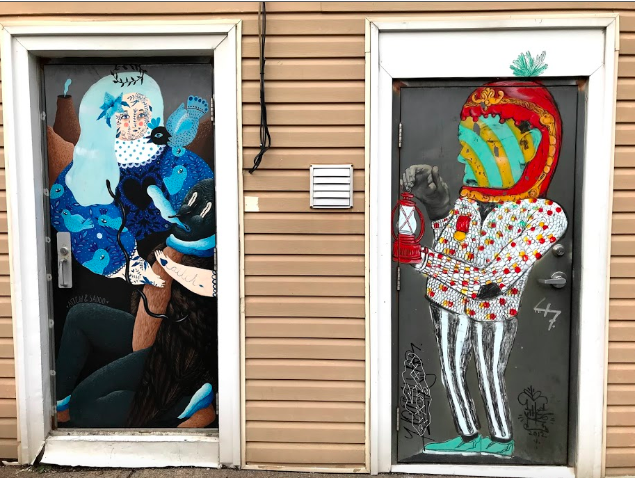 Loved these doors with fantasy figures painting on the doors.
