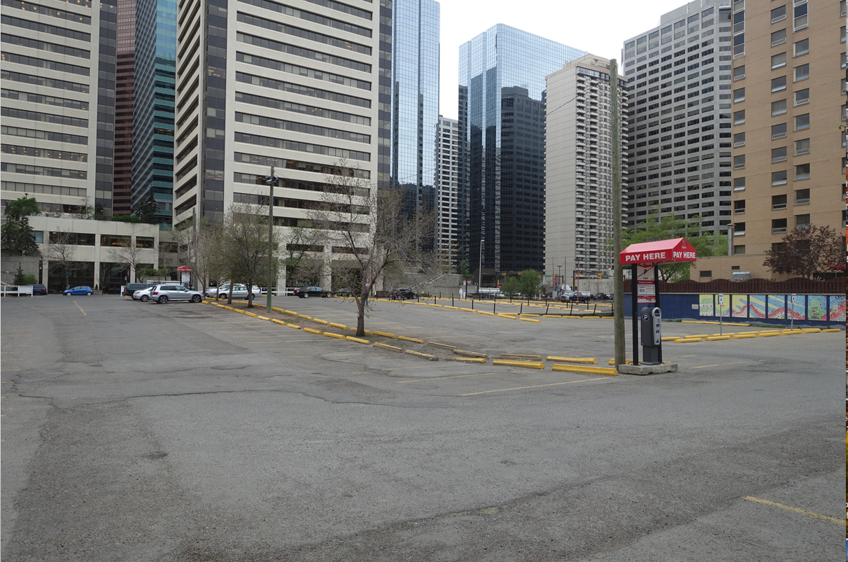 The site is currently a surface parking lot, which is full during the week with office workers parking all day, but empty most evenings and weekends as are lots of parking lots in the downtown.