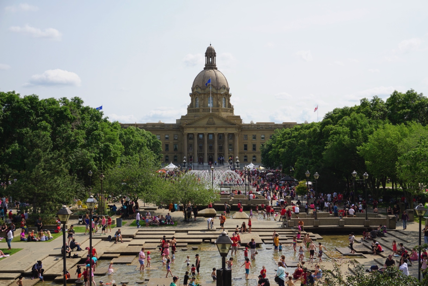The Alberta Legislature buildings fountain and wading pond is a popular spot on Canada Day.