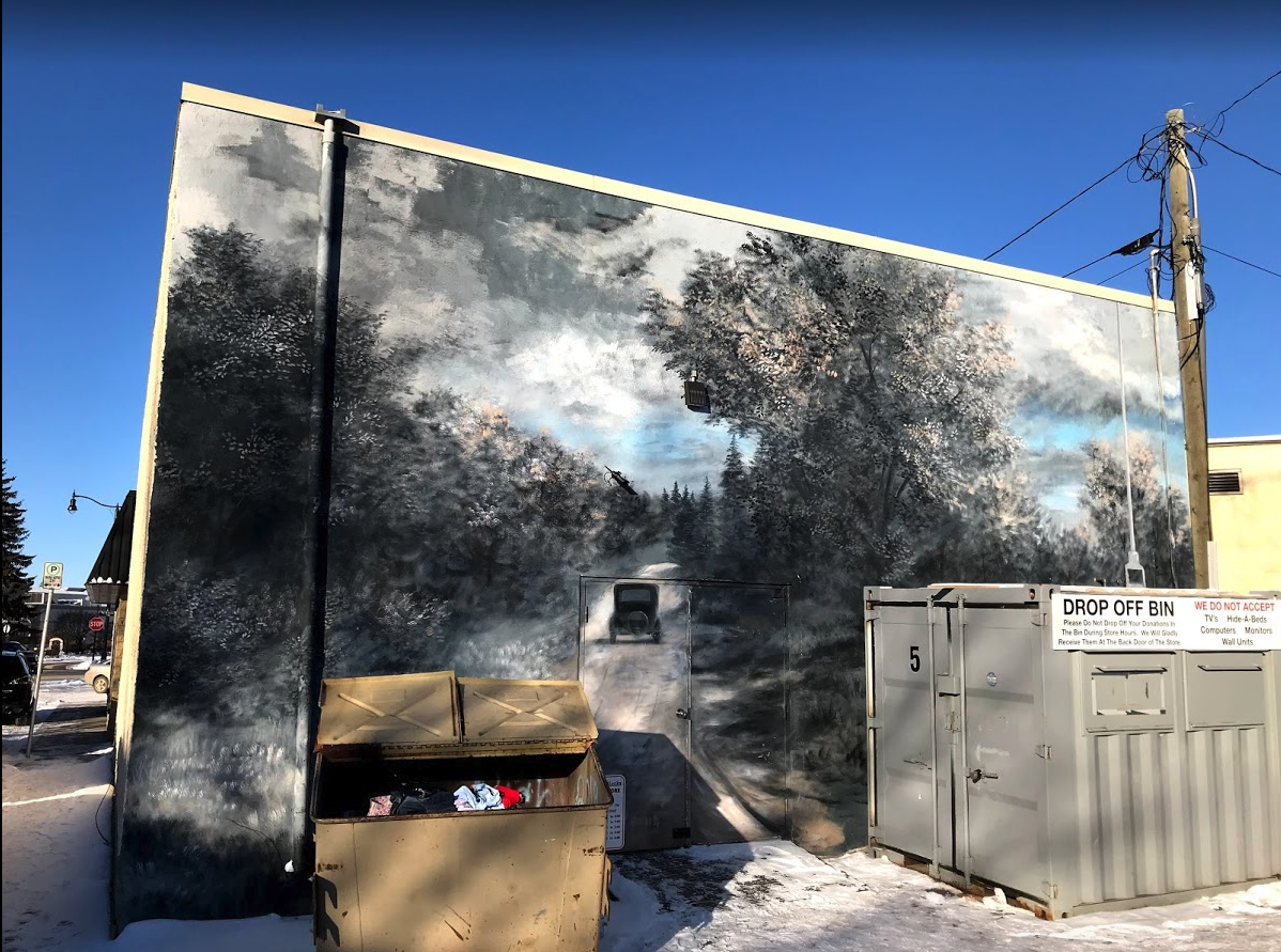 There is something intriging about how the murals and the dumpsters are juxtaposed.