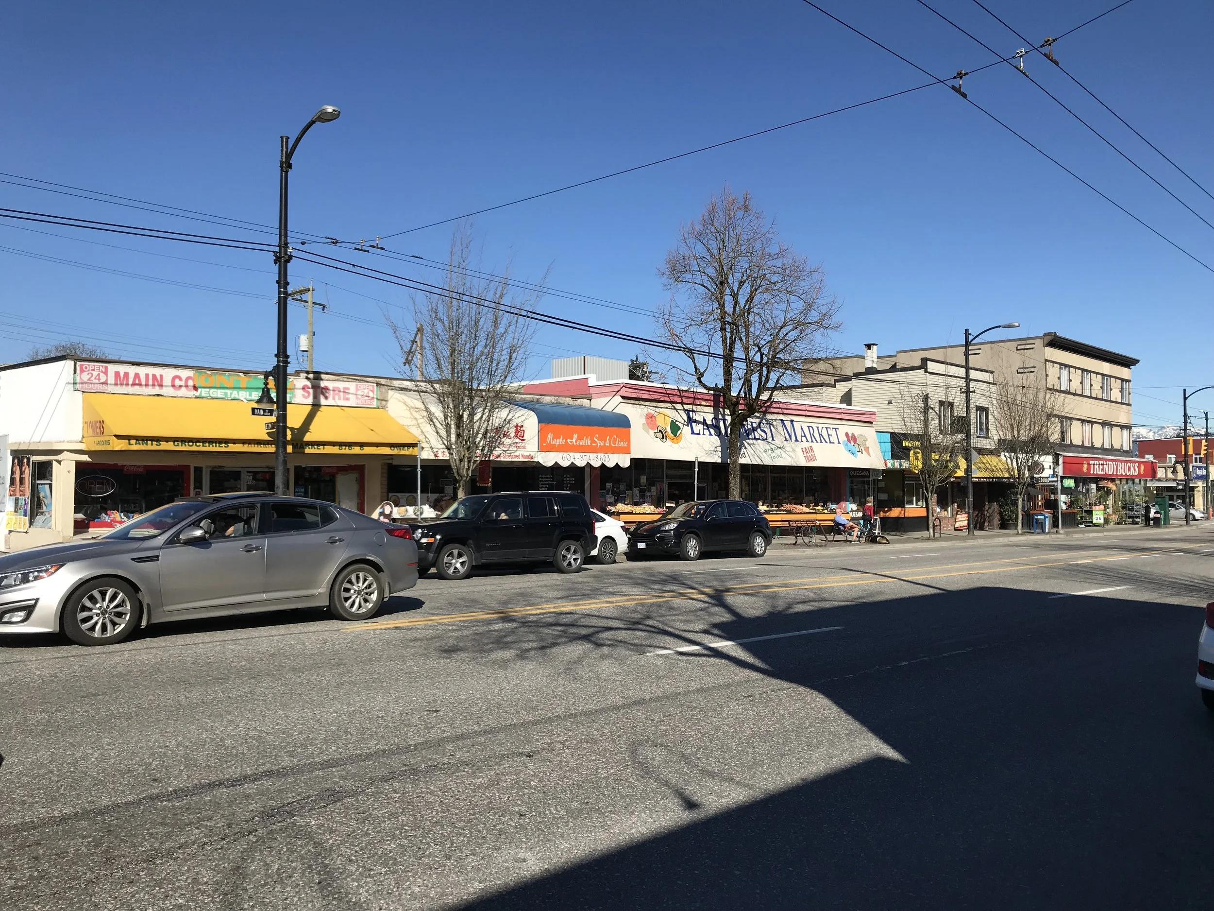 This is a typical block along Vancouver’s Main Street. It has just the right amount of charm and clutter, old and new, low and highbrow to create a fun walkable street that is full of useful shops that meet the everyday needs of locals.