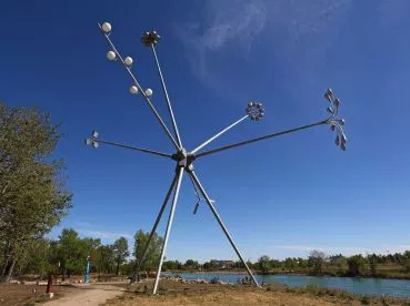 Speaking of street lights, this public art work on St. Patricks’ Island title “Bloom” by Michel de Broin, that incorporates vintage street lampposts welded to tripod is also as much an engineering feat, as an artist’s statement.