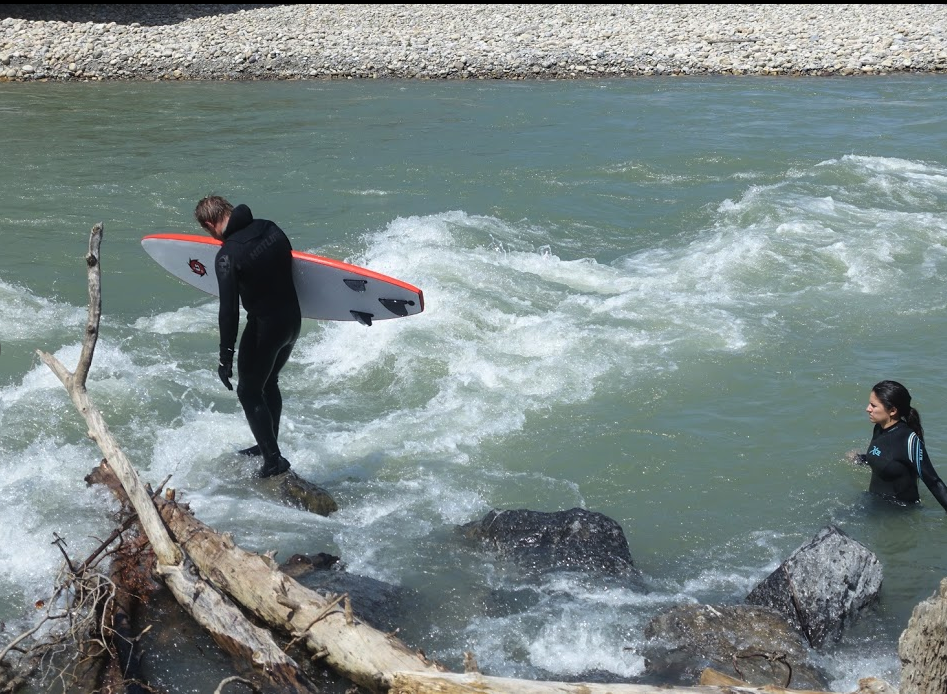River surfing on the Bow River is popular at the Louise Bridge in Eau Claire