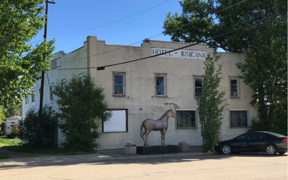 The Irricana Hotel a reminder of the community’s once bustling Main Street. Today “Old Smoky” stands guard. The plaque says the horse was fabricated by Kevan Leycraft and donated by Melvin Brown to commemorate his residence in Irricana since 1952. He passed away in 1997.