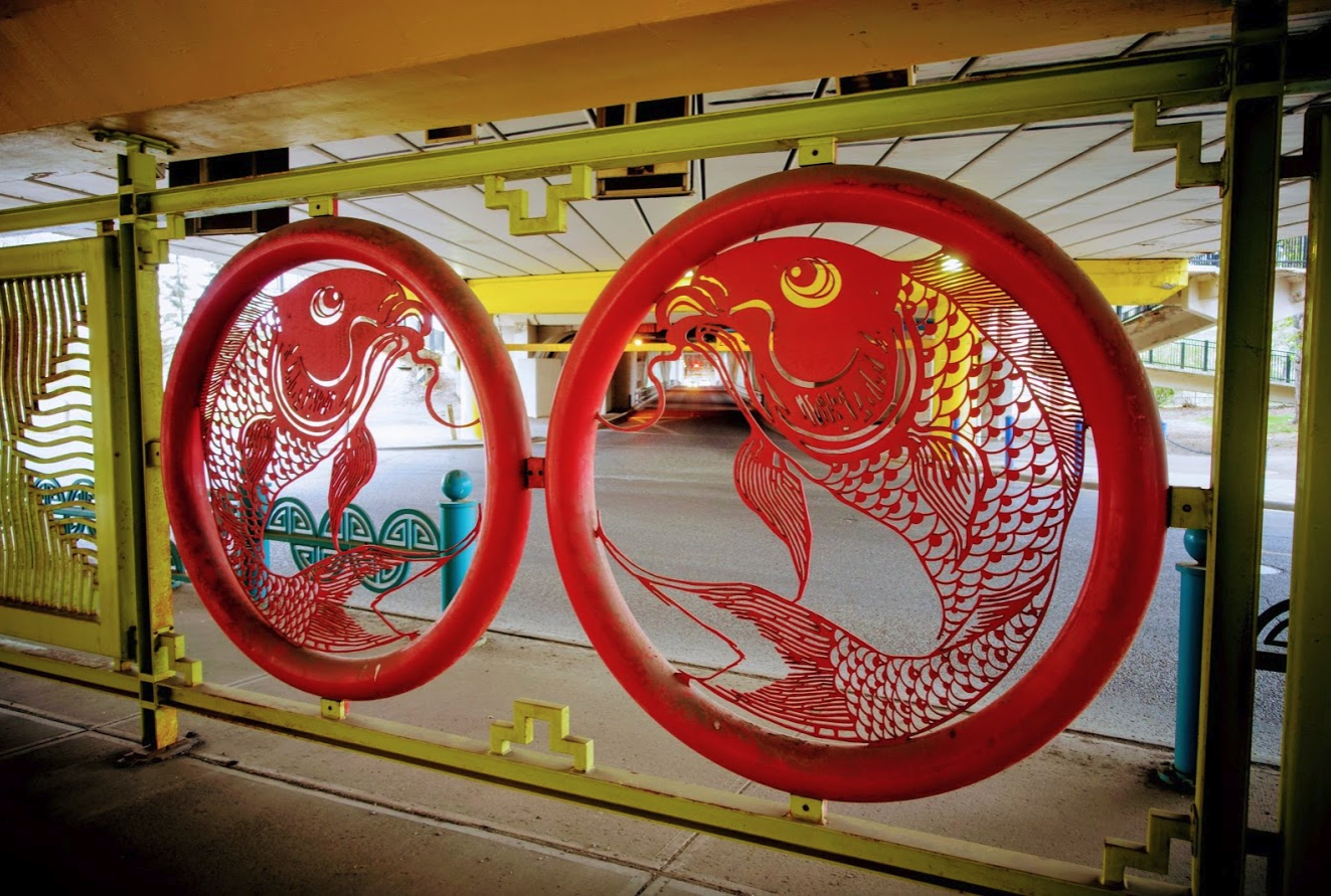 As you pass under the Centre Street bridge don’t miss the decorative Chinatown fence.