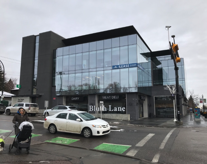 Blush Lane organic grocery store anchors the new Odeon Building with office above.