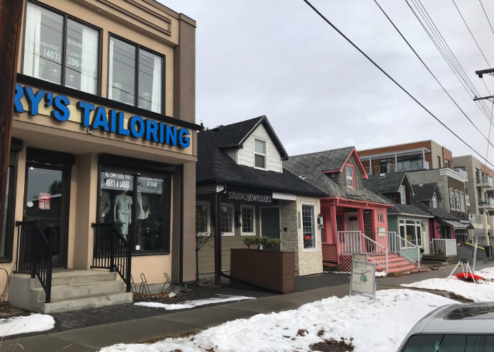 There is a fun block of colourful cottage homes along 34th Ave SW that have been converted into businesses.