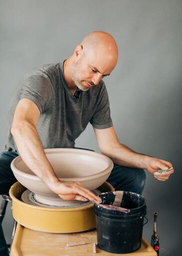 Rob Sutherland Rob came back from Oxford University with a PhD in Molecular Ecology and took a sharp turn. After taking his first pottery class in 2001, he was hooked, and has been running Good Dirt since 2004. Rob has a love of music and plays cello, mandolin, violin, guitar, ukulele, and anything else he can gets his hands on. He’s even making mandolins these days. Rob’s pottery focuses on form, and he loves surfaces created through woodfiring, where the pot is painted by the ash and path of fire through the kiln. Recently, he and his wife, Jessica, have begun collaborating, bringing their varying loves and interests together. Smooth segue to…