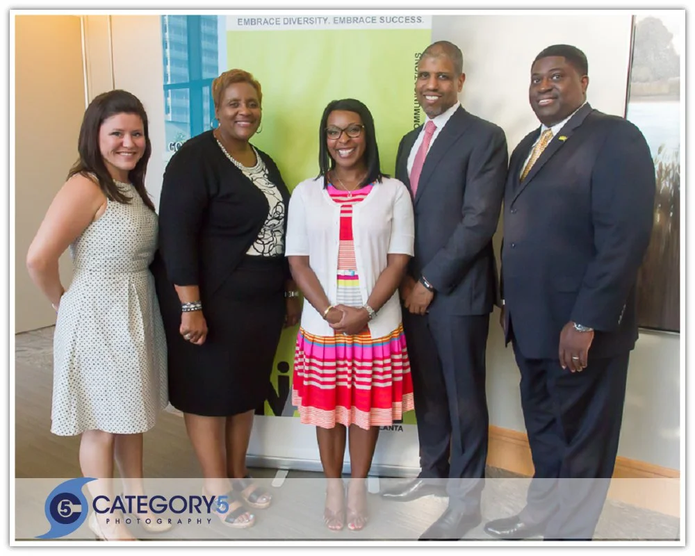 NAMIC Atlanta's leadership team. Secretary Erin Kaczmarczyk, Treasurer Joyclan Sumpter, Vice President Alana Moton-Leverette, Keynote speaker Martin Davidson; and NAMIC Atlanta Chapter President, William B. Cossey Jr. 
