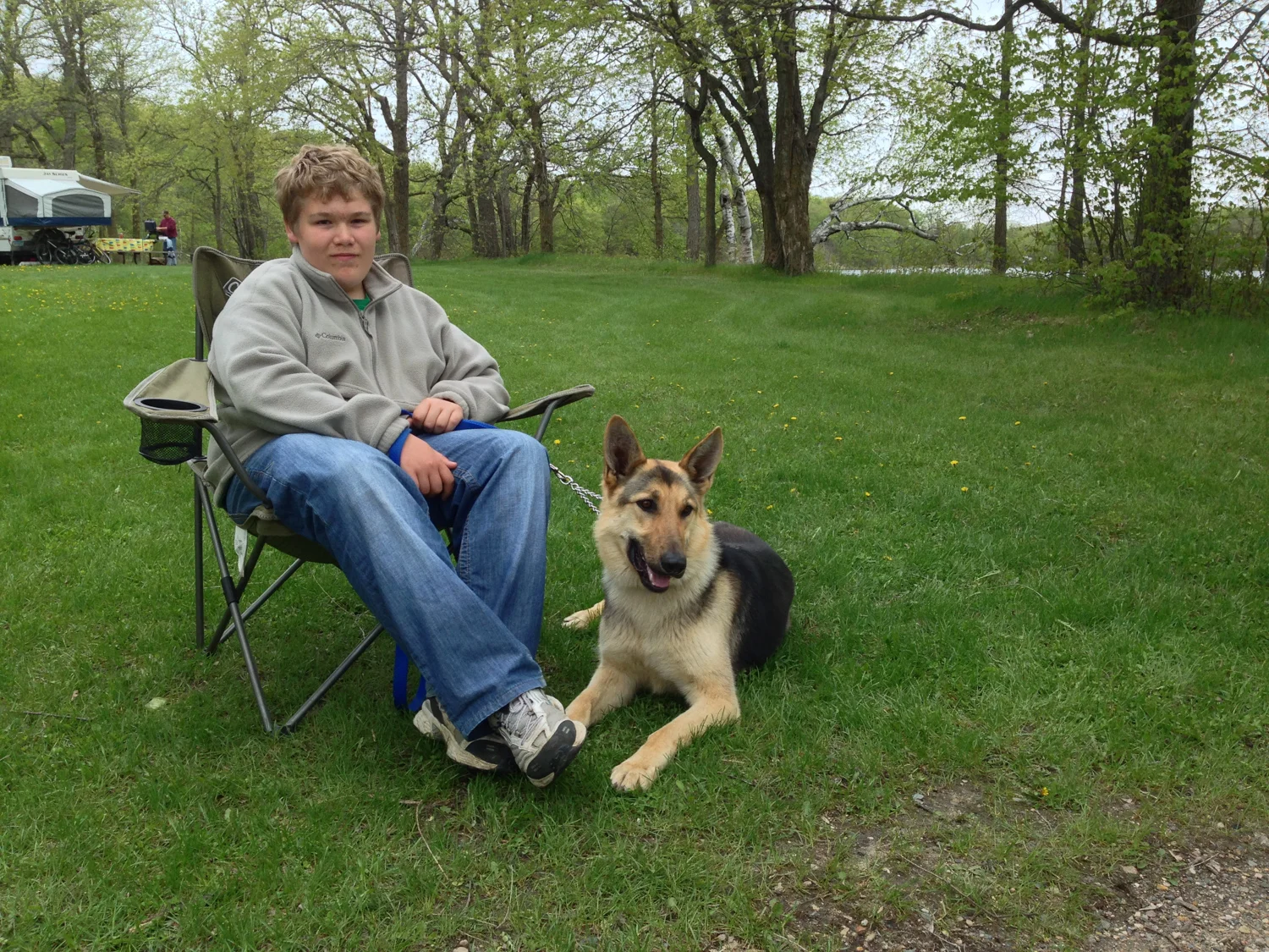 Jacob and Max (the wonder dog) hanging out near the campfire.