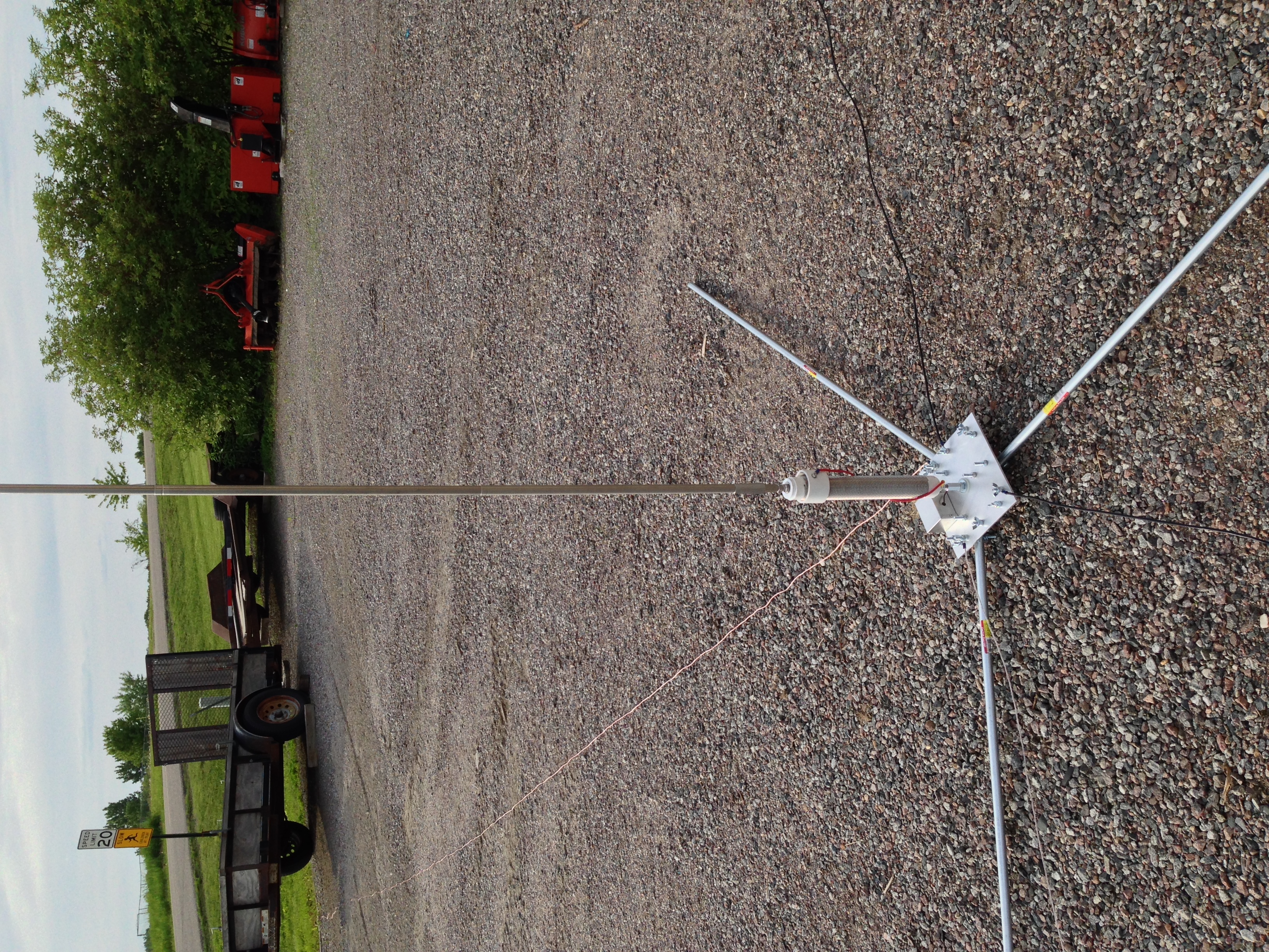 Closeup showing the base+radials+loading coil+bottom of the mast