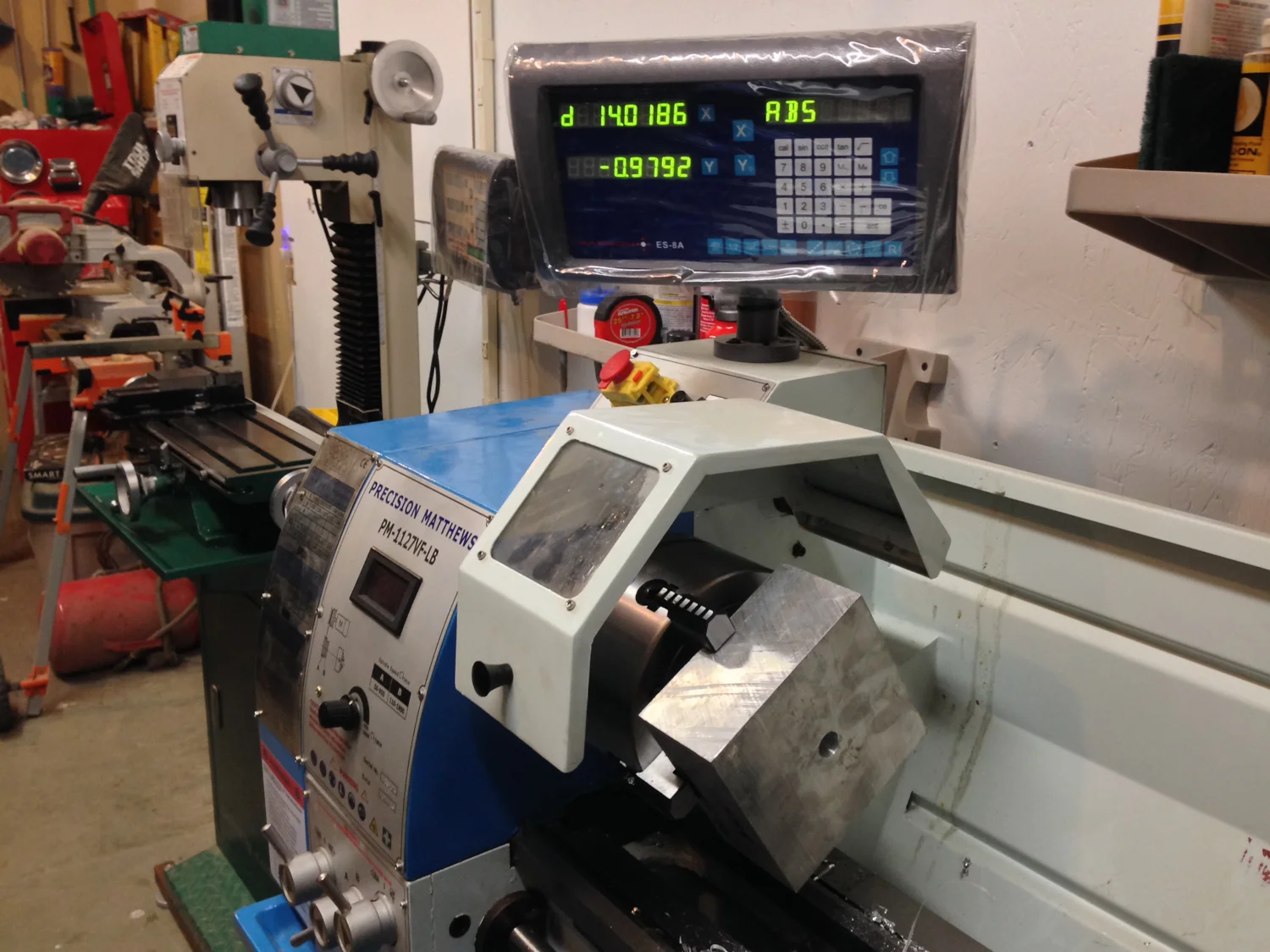 My first project on the new lathe involves a 6 pound block in a four jaw chuck