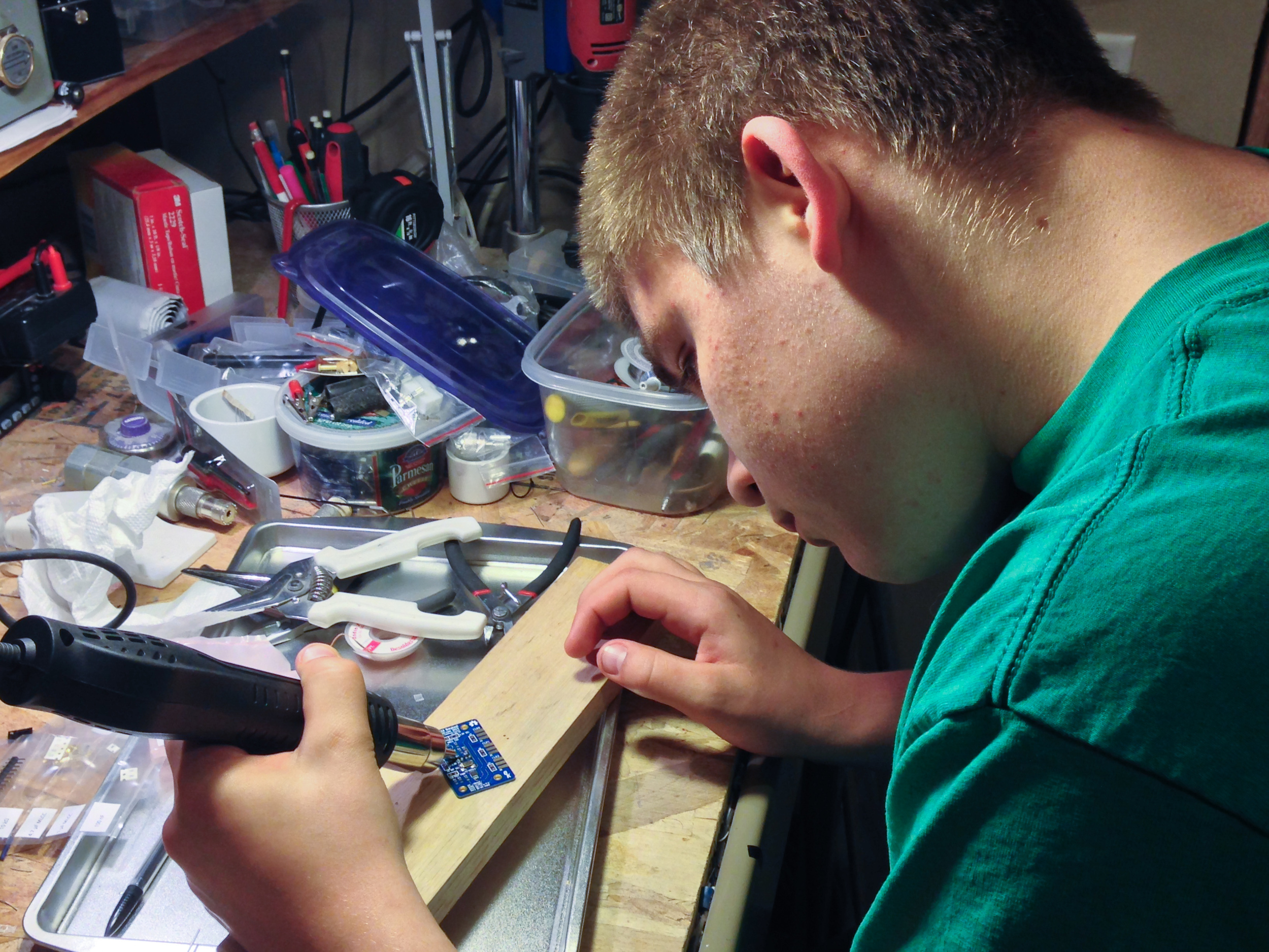 Ben (N2BEN 14) is using the reflow station for the first time after watching me
