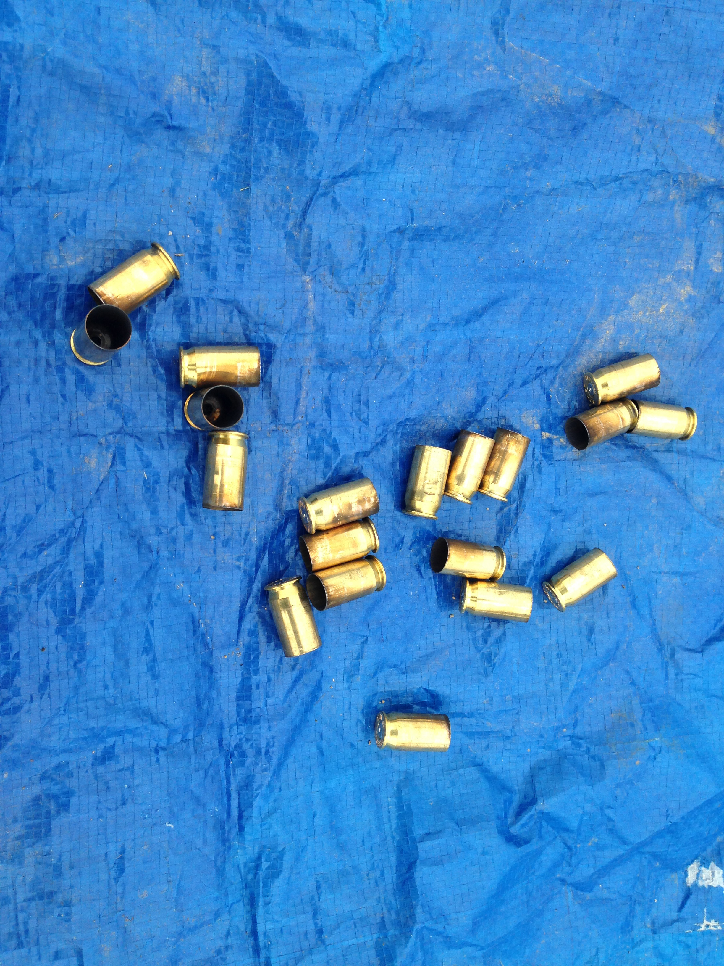 Catching the brass on a tarp for reloading