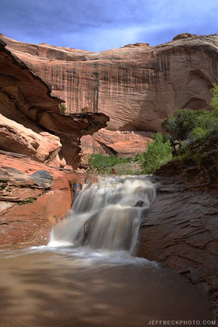 Coyote Gulch has soaring walls and a sculpted streambed.