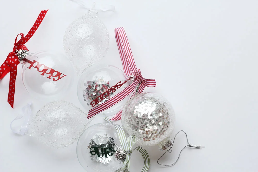 Personalised papercut bauble © studio seed Photograph by Alex Carlile