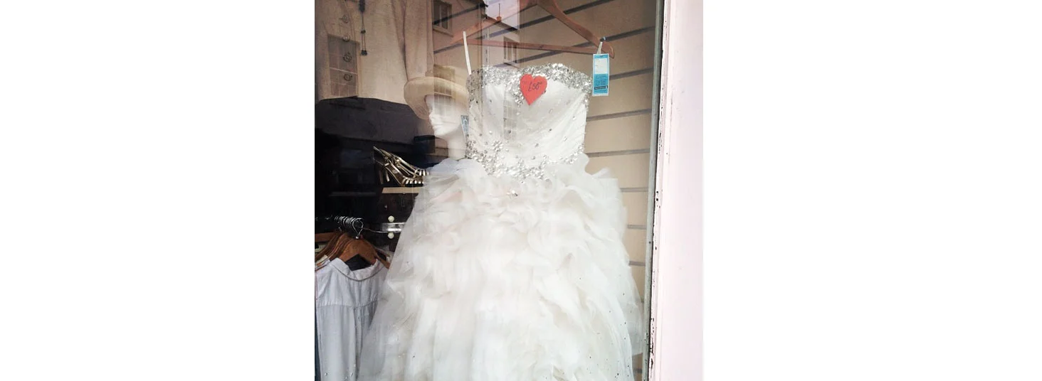 Maybe I should choose this bargainous dress from the House of Liberace aka Oxfam?