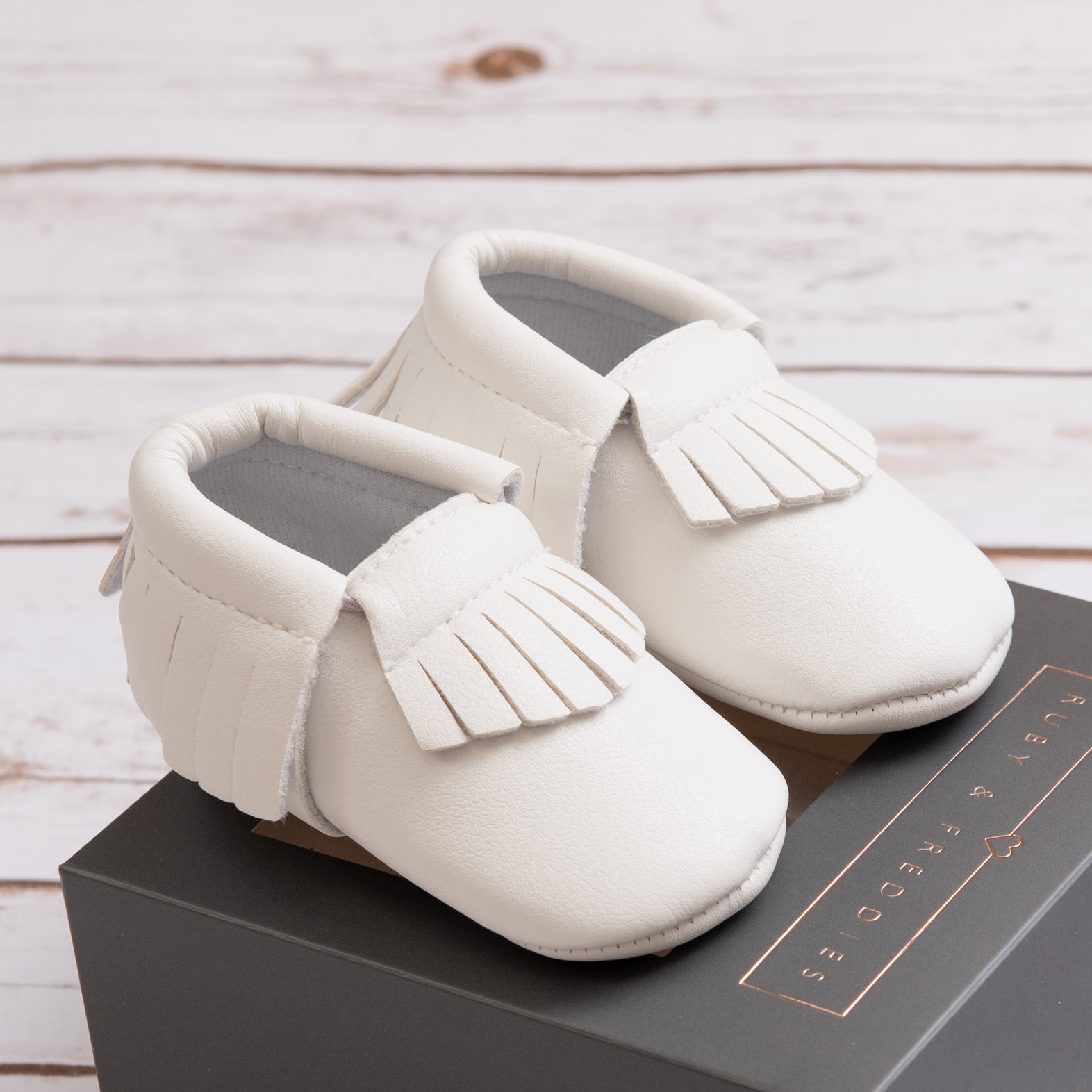 White-Baby-Moccasins-1.jpg
