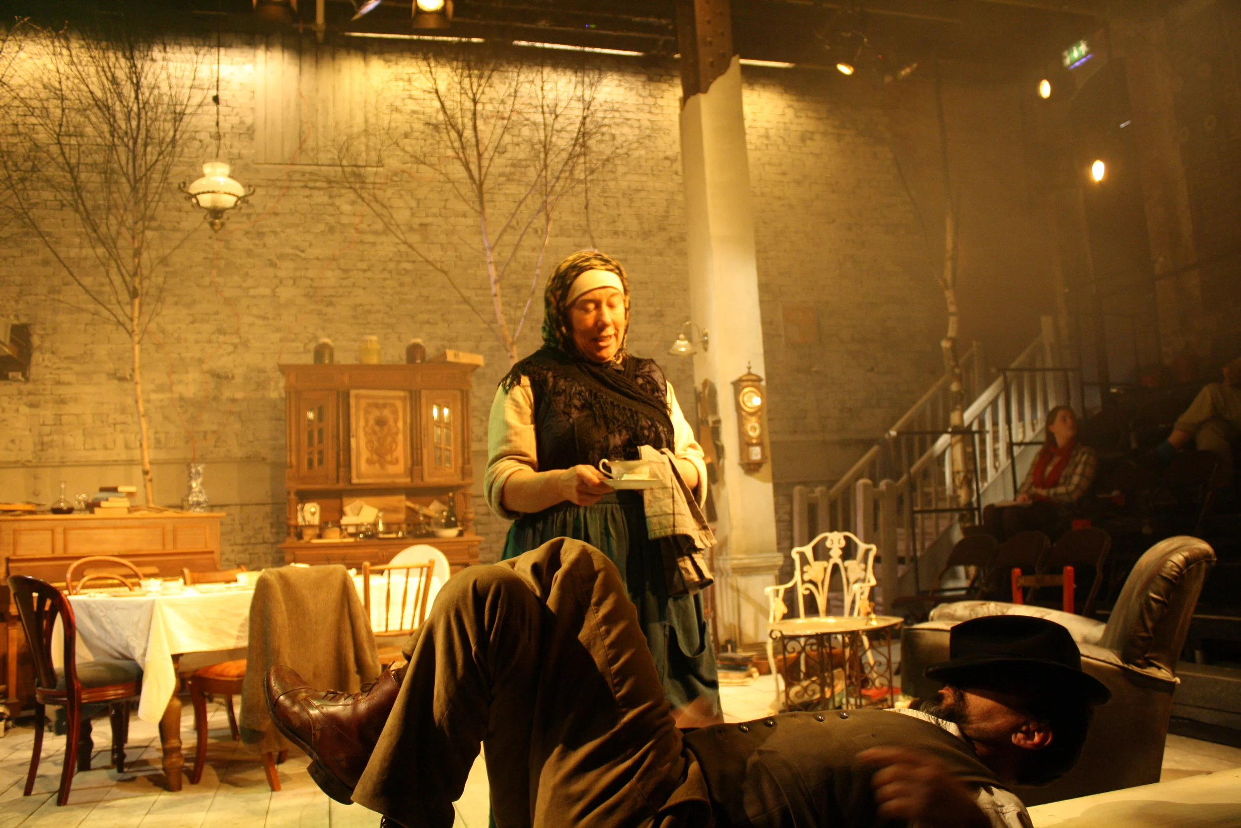   Uncle Vanya  (2011) Directed by Helena Kaut-Howson for Belgrade Studio Theatre and Arcola Theatre.  Photographer: Alex Wardle   The Guardian review:   'Real trees and scattered furniture combine to evoke, in Sophie Jump's design, both the immensity