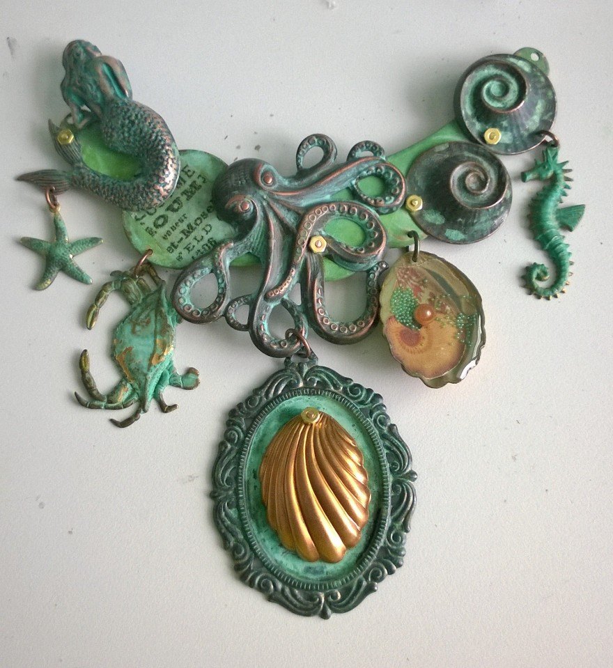 Mermaid was replaced with brass shell and all major pieces were secured to brass necklace blank