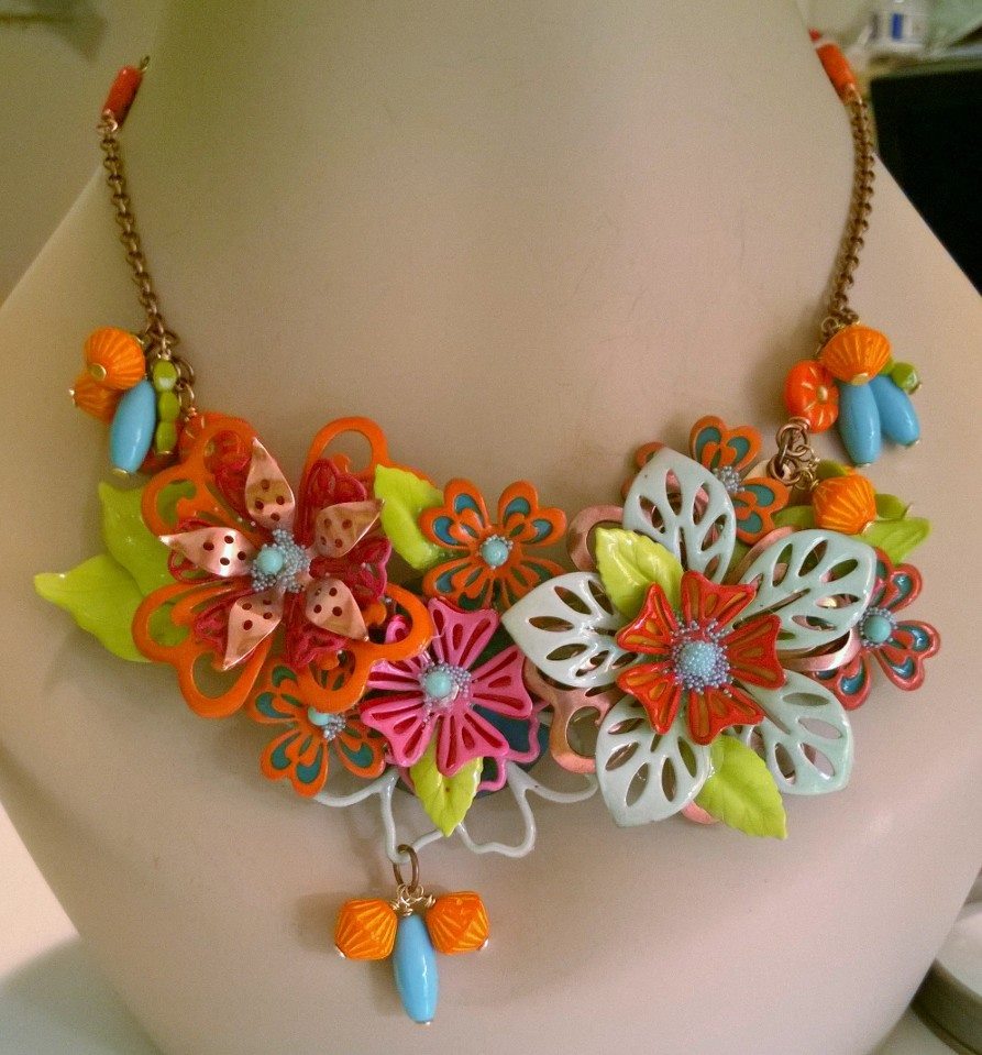 The final piece came together beautifully with rose brass accents and chain. The Czech glass beads are the perfect addition. I think my "leftovers" make my original pieces look "meh". I may have to rework them into something more like this piece!