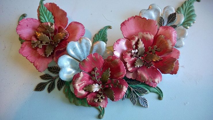 Once the pinotage flowers were dry, I added verdigris and chocolate bronze leaves as well as a shabby chic white flower dusted in gold for contrast.