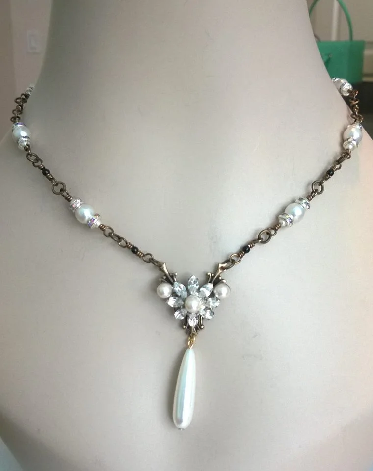 Upcycled rhinestone and pearl component mounted on brass filigree with hand-wrapped chain of pearls and Czech glass.