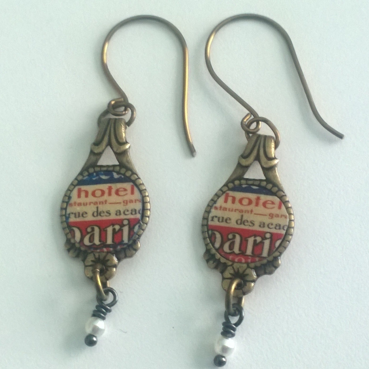 Adorably wearable Travel earrings.