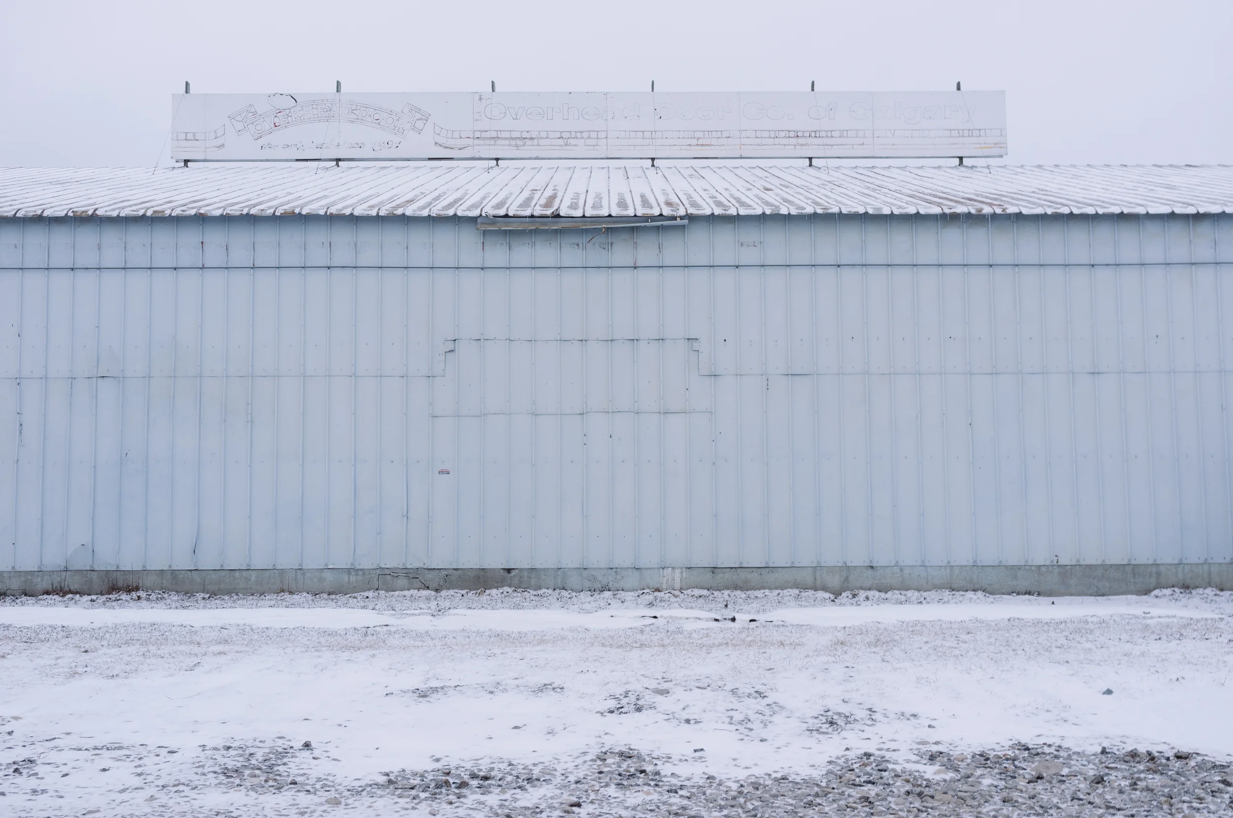 Revisiting old, favourite locations. Overhead Door. Ramsay, Calgary, Alberta, 2013.