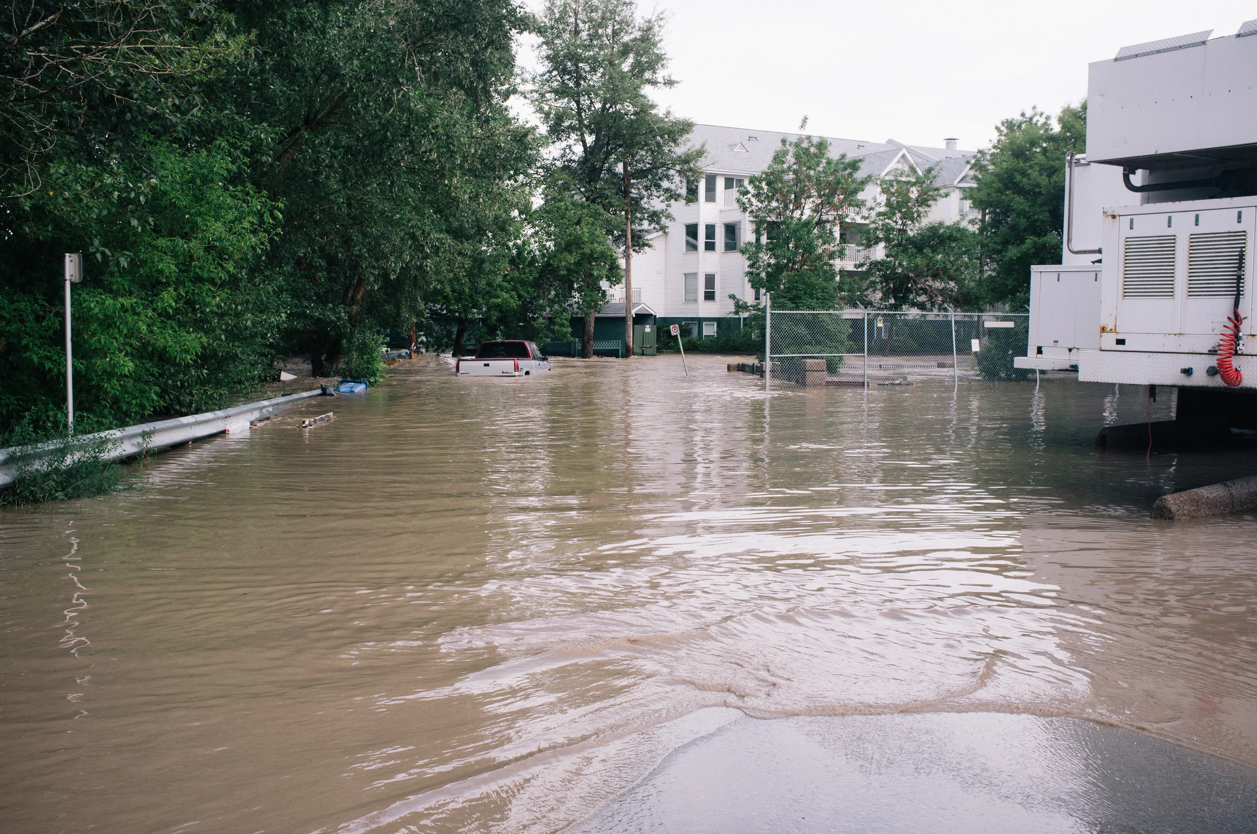 Holy Cross Lane at 1st Street SW. I was trying to get to a friend's place to check on things but had to turn back. The water was moving with some strength here and was unsafe to cross. Mission.