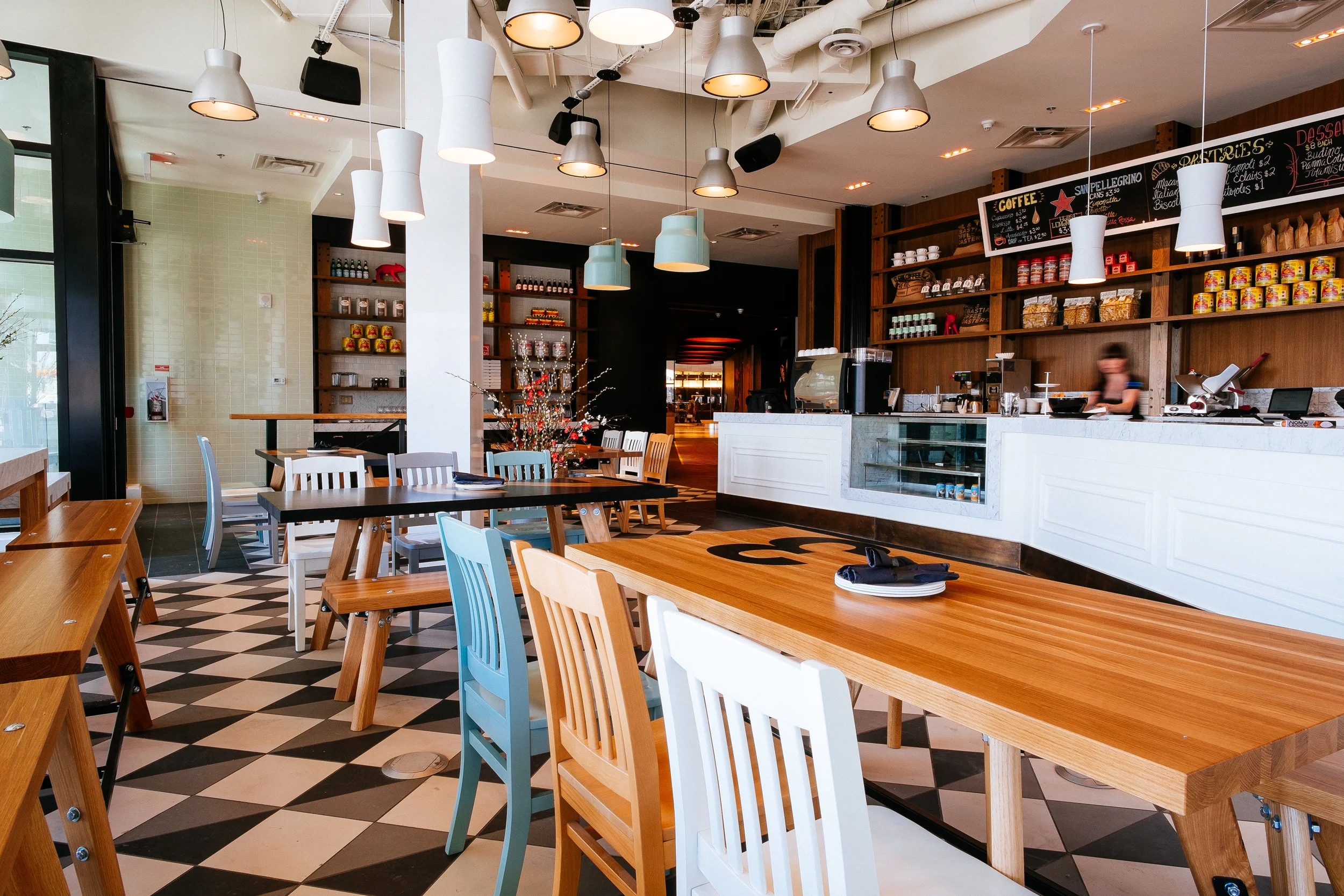 Osteria. The main-floor bar boasts a dedicated kitchen and brick pizza oven.